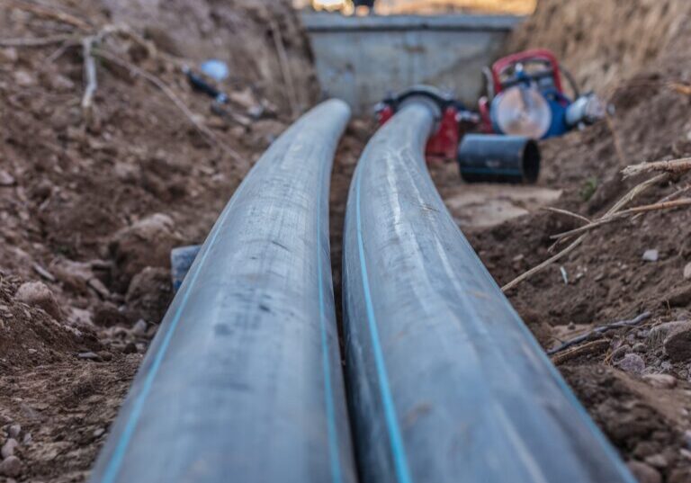 sewer pipes with water are laid underground